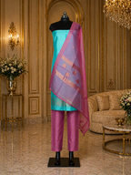 Teal Green Banarasi Handloom Luxury Suit set contrast with Pink color.