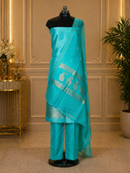 Teal Green Banarasi Handloom Luxury Suit set contrast with Aqua Teal Green color.