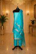 Teal Green Banarasi Handloom Luxury Suit set contrast with similar teal green color.