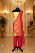 Yellow Banarasi Handloom Luxury Suit set contrast with light pink color.