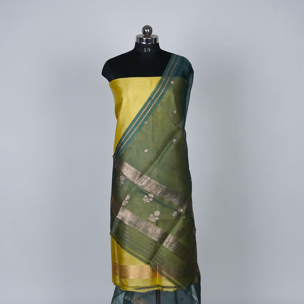 Yellow Banarasi Handloom Luxury Suit set contrast with emerald deep green color.