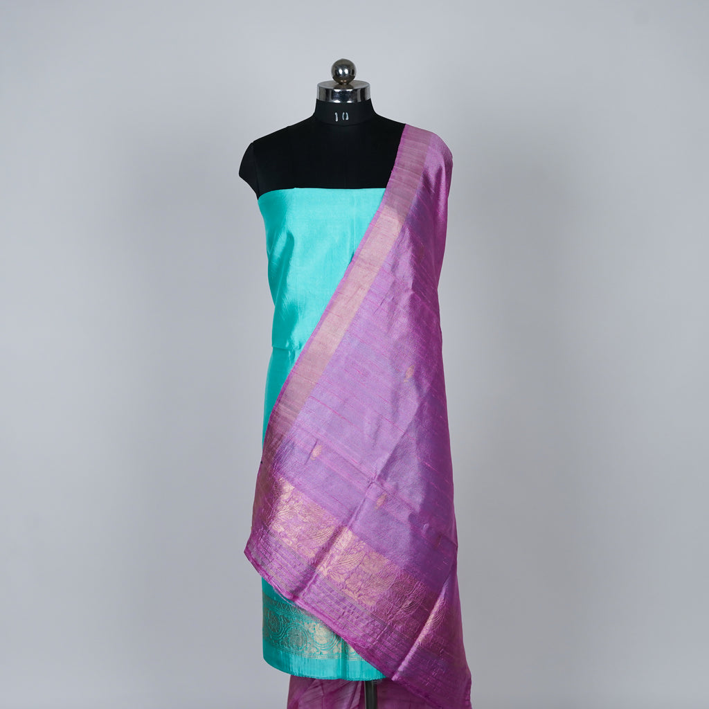 Teal Green Banarasi Handloom Luxury Suit set contrast with pink color.
