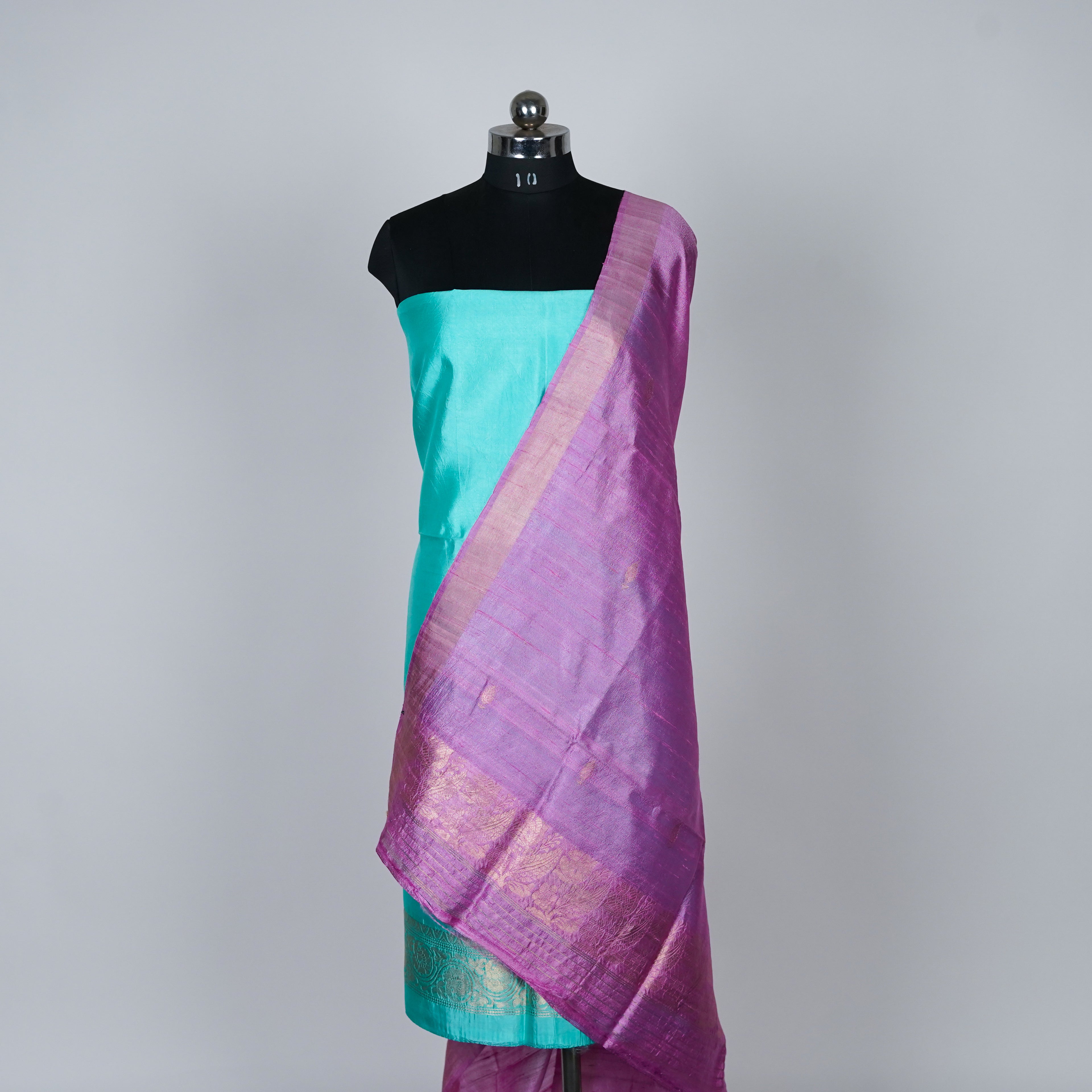 Teal Green Banarasi Handloom Luxury Suit set contrast with pink color.