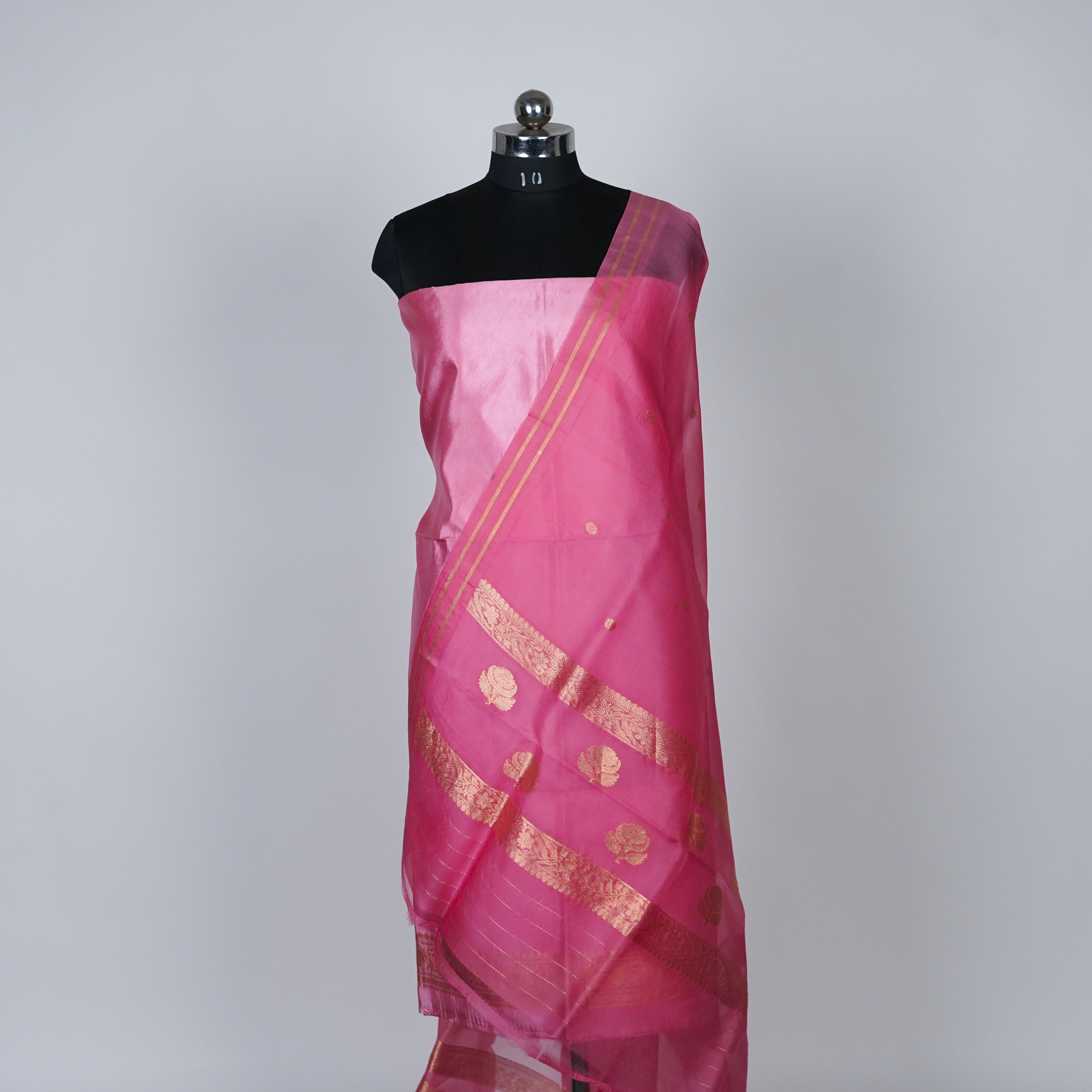 Pink Banarasi Handloom Luxury Suit set contrast with same pink color.