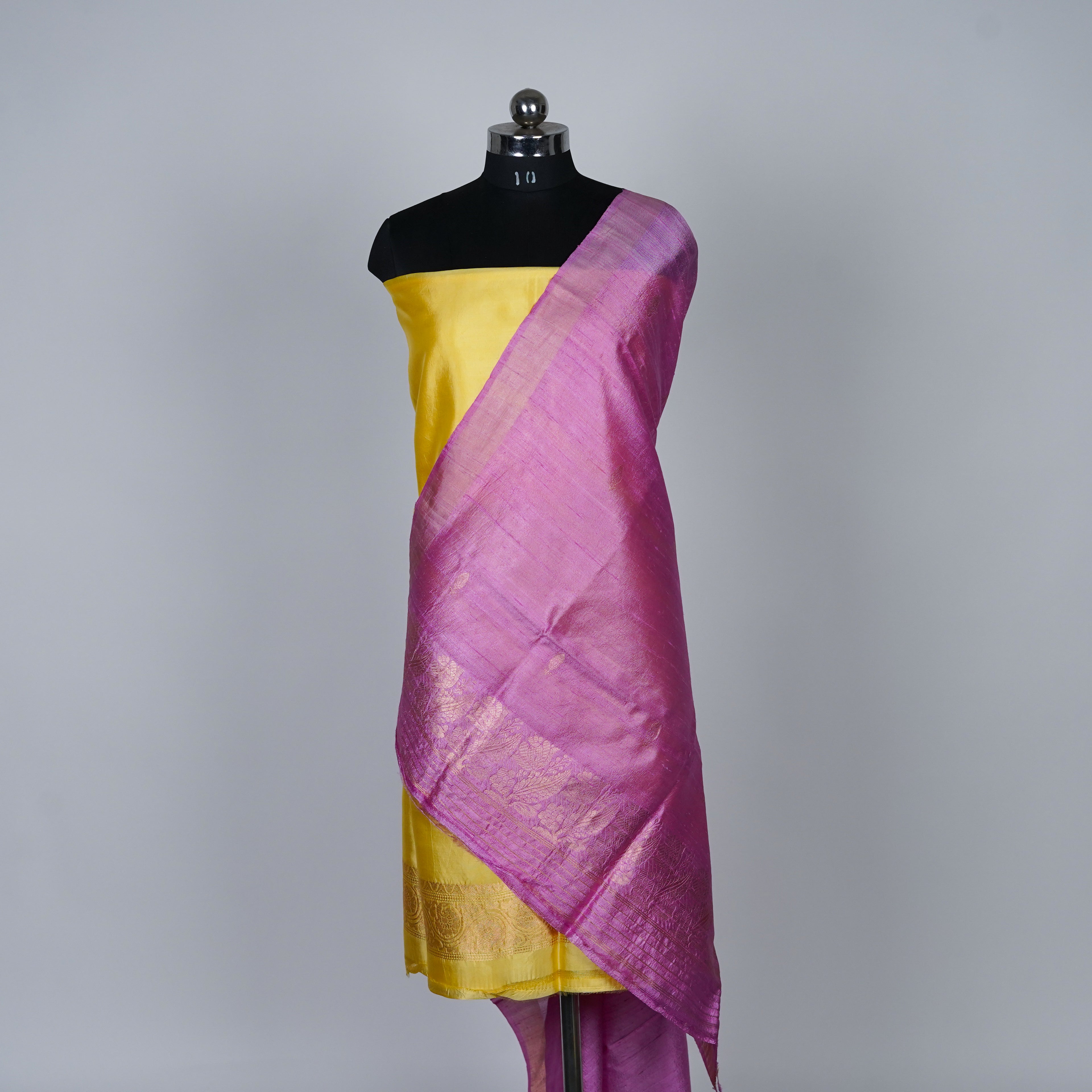 Yellow Banarasi Handloom Luxury Suit set contrast with pink color.