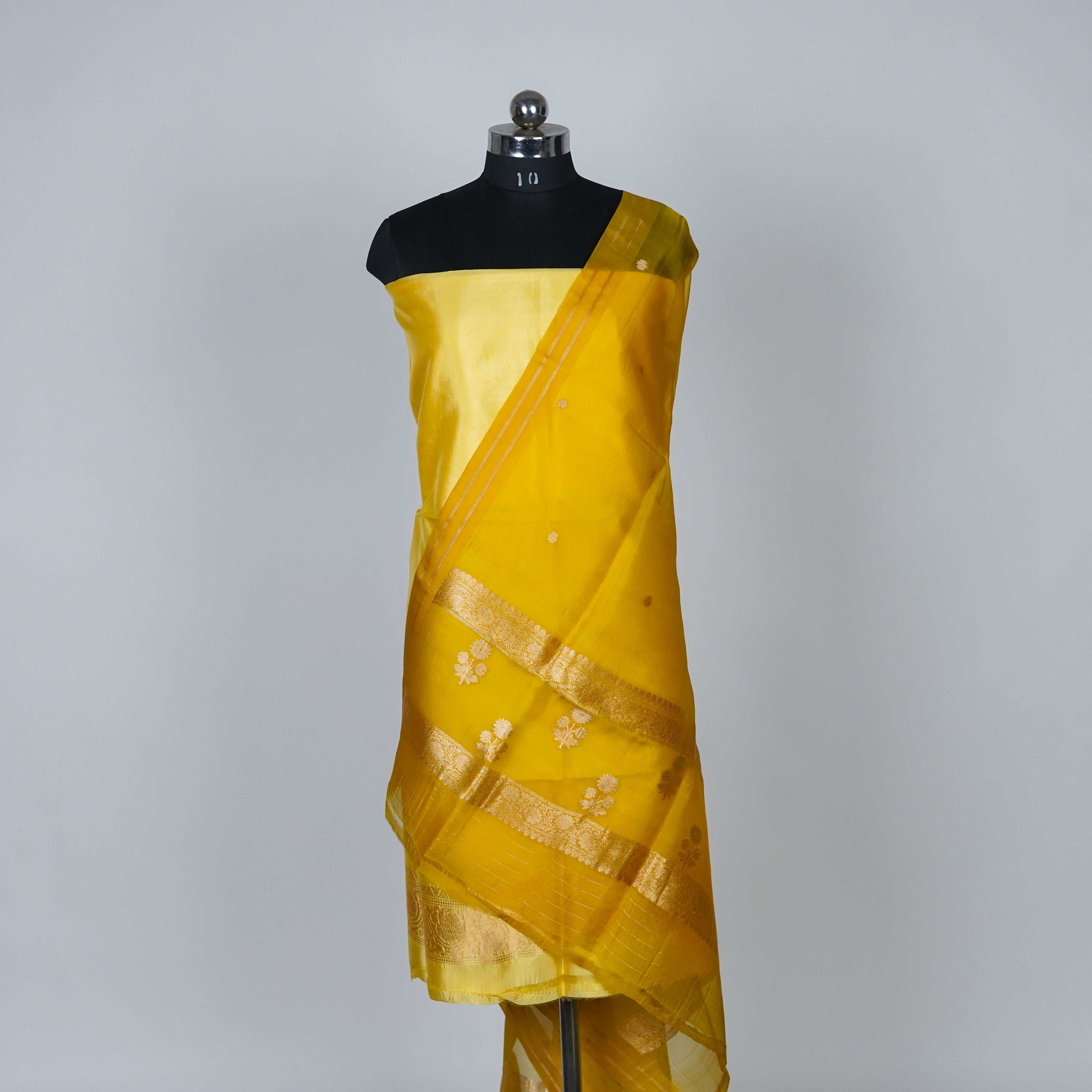 Yellow Banarasi Handloom Luxury Suit set contrast with golden yellow color.