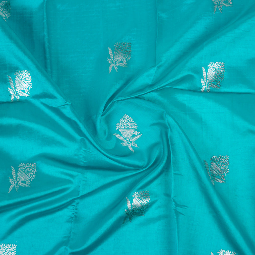Aqua Green - Pure Raw Mango Banarasi Saree with Silver Zari and Skirt Border Design