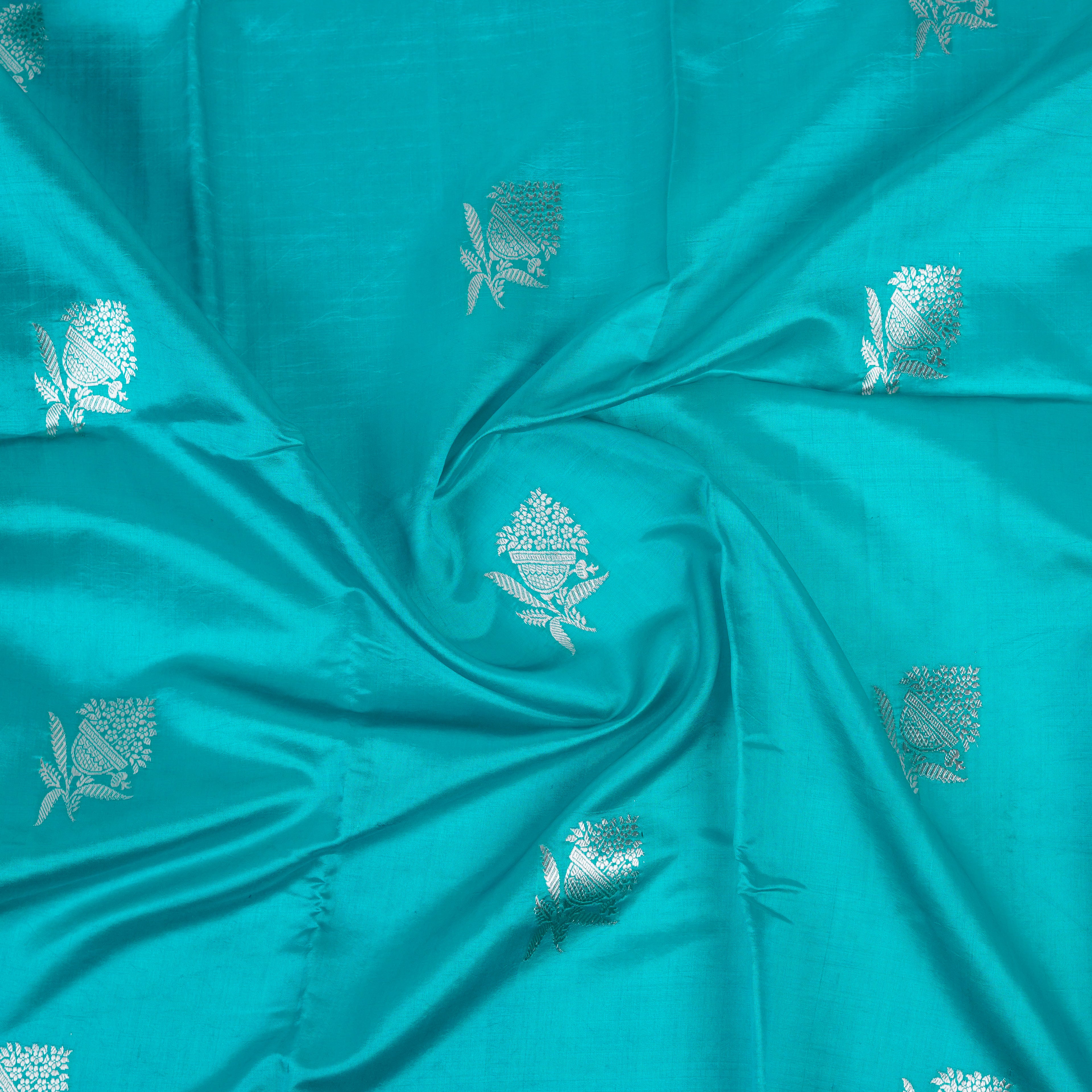 Aqua Green - Pure Raw Mango Banarasi Saree with Silver Zari and Skirt Border Design