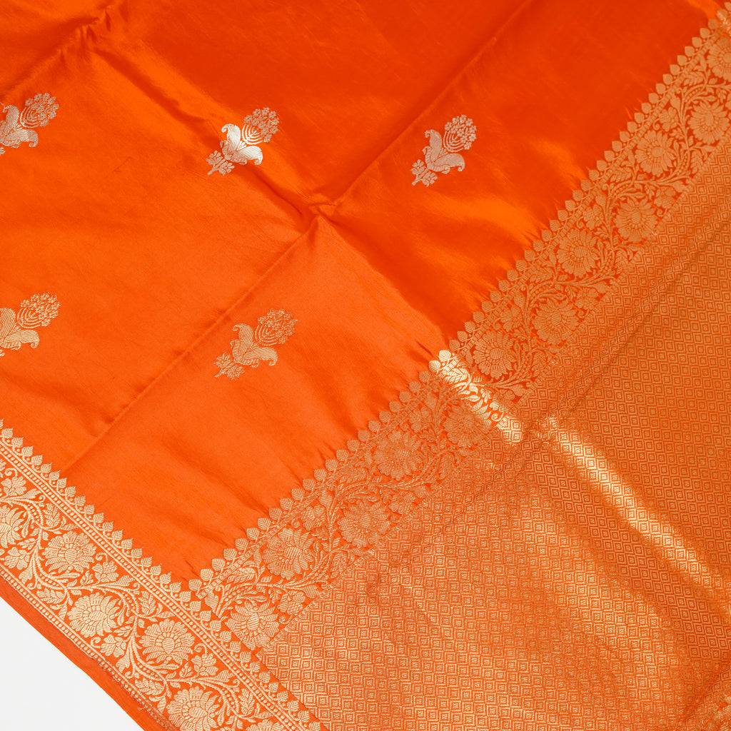 Rust - Pure Raw Mango Banarasi Saree with Golden and silver Boota Motifs