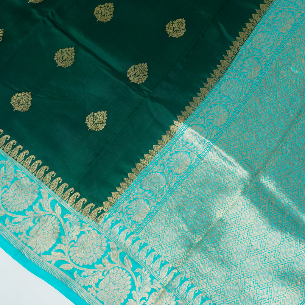 Bottle Green Contrast with Sky blue border - Pure Raw Mango Banarasi Saree with Golden Boota Motifs