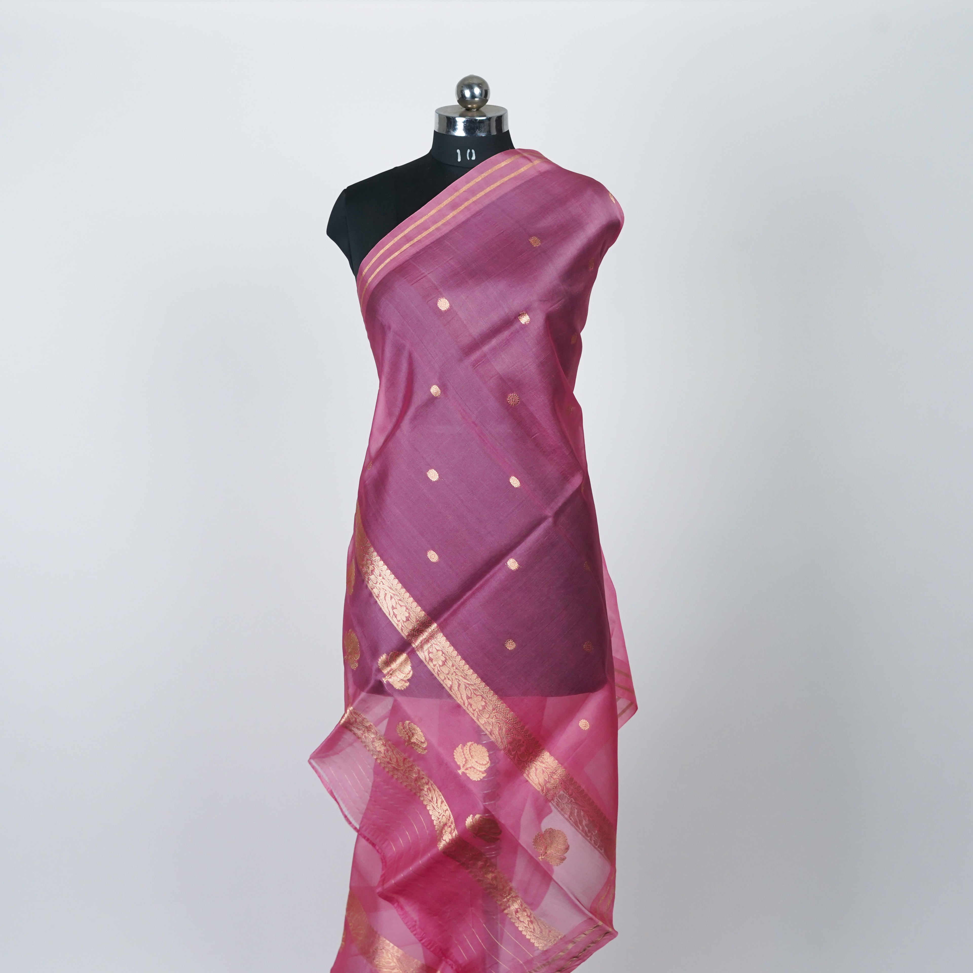 Pink Banarasi Handloom Luxury Suit set contrast with same pink color.