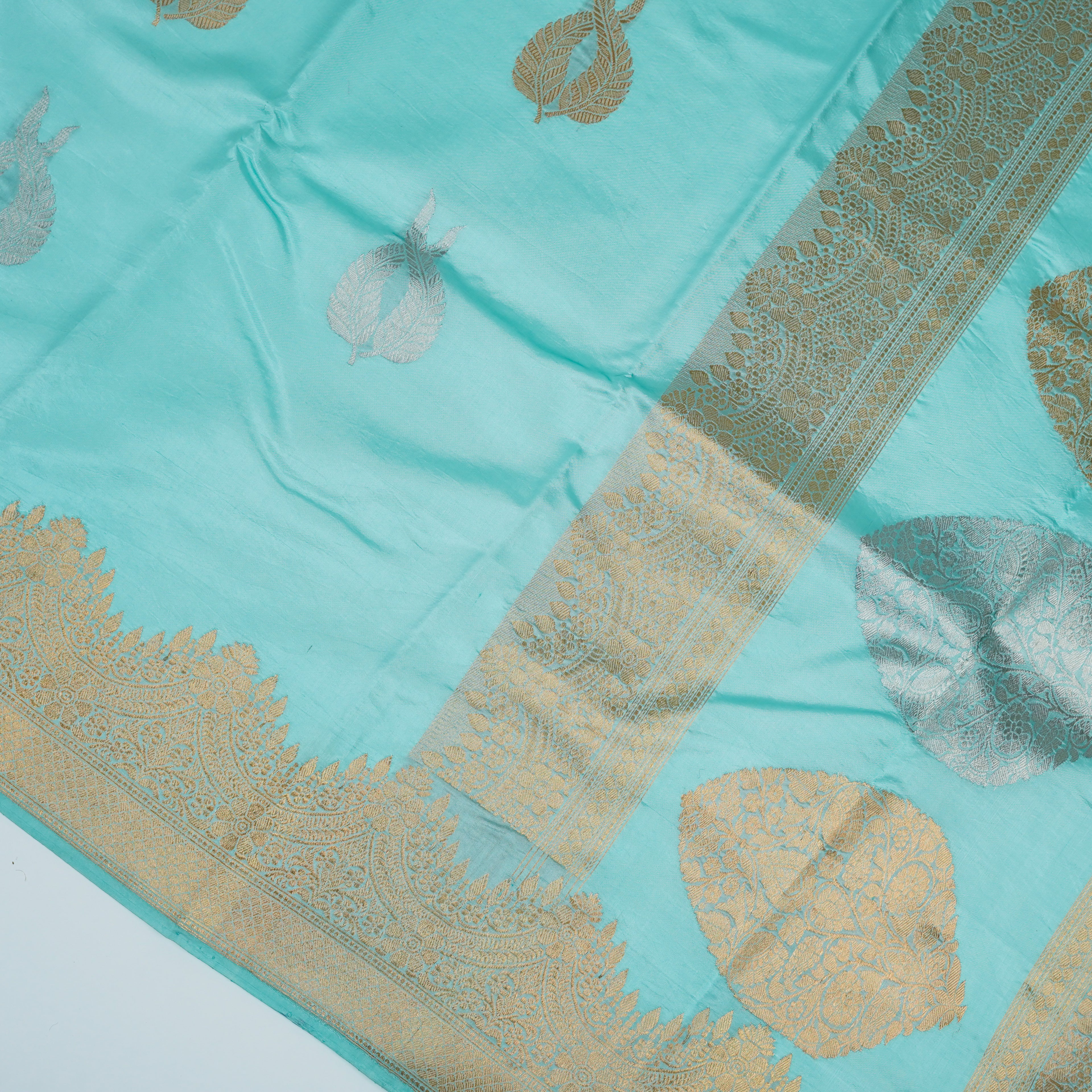 Light Sky Blue Pure Silk Banarasi Saree with attractive Golden and silver boota design